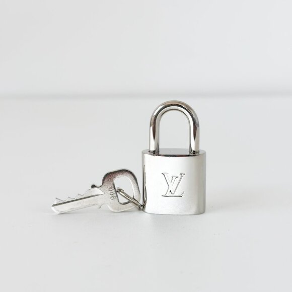 Authentic Louis Vuitton Silver Padlock 446